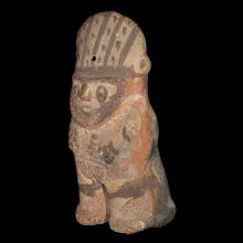 Hominoid terracotta figure